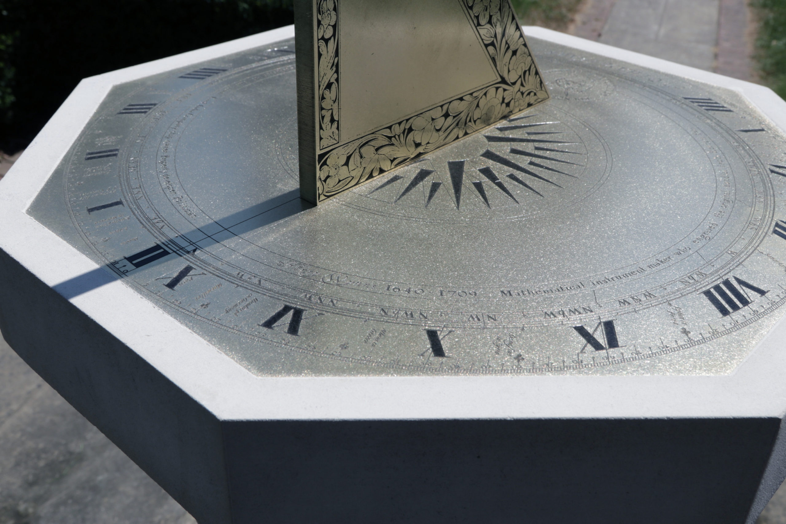 sundial man climbing